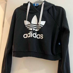 Cropped adidas black hoodie. Size: US L.
